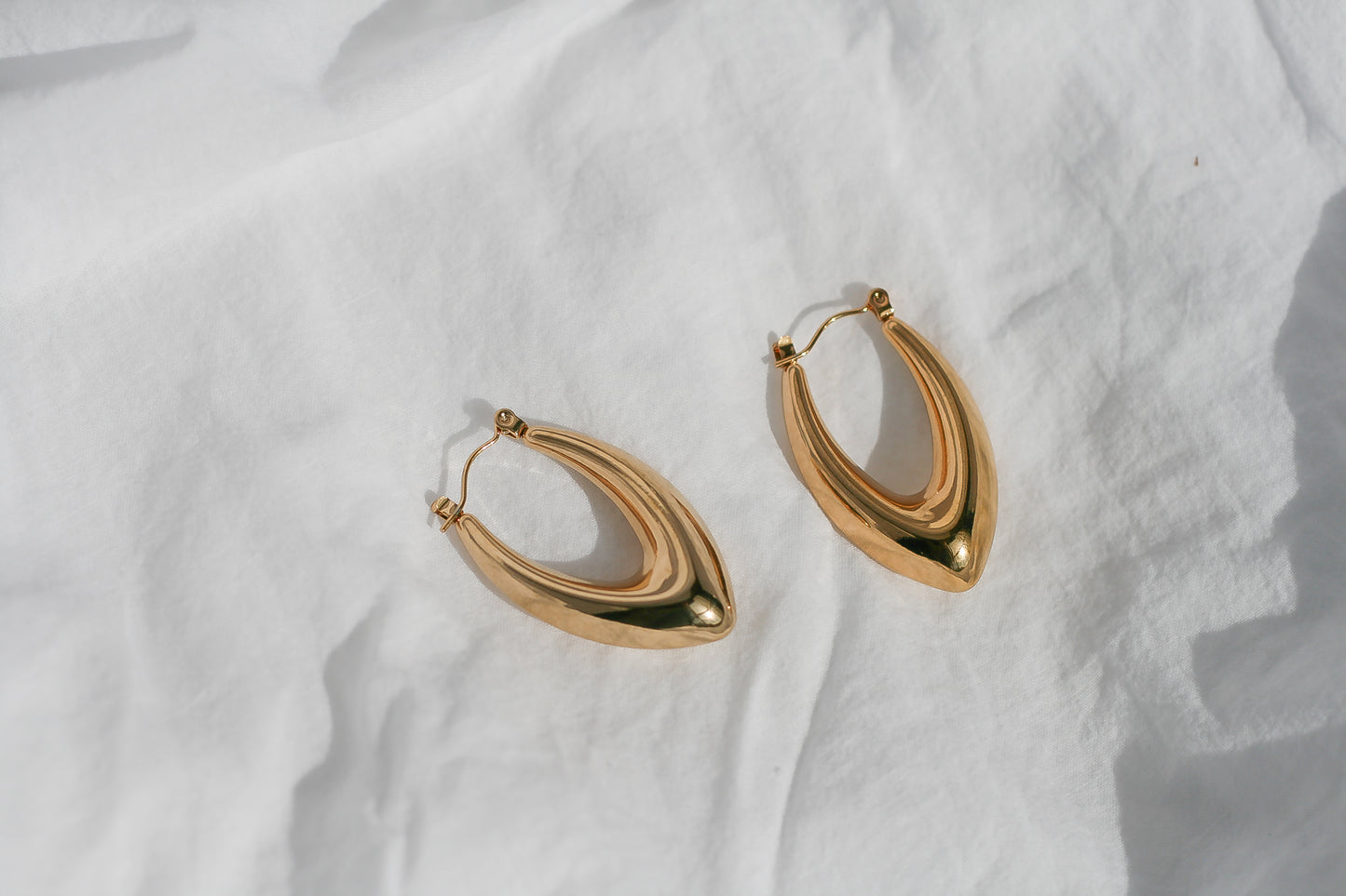 Sleek Gold Teardrop Hoop Earrings