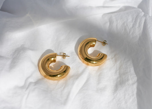 Sculpted Elegance Silver Hoop Earrings